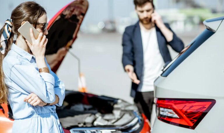 Driver calling insurance company after a car accident to file an injury claim on time