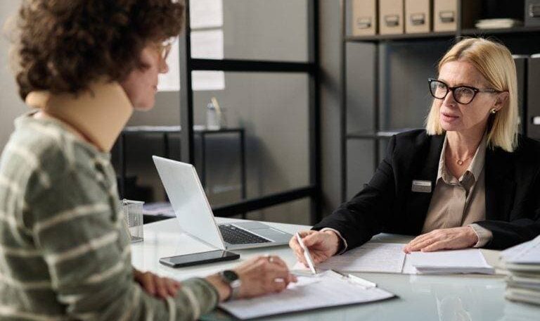 Client discussing New York no-fault insurance claim with an attorney