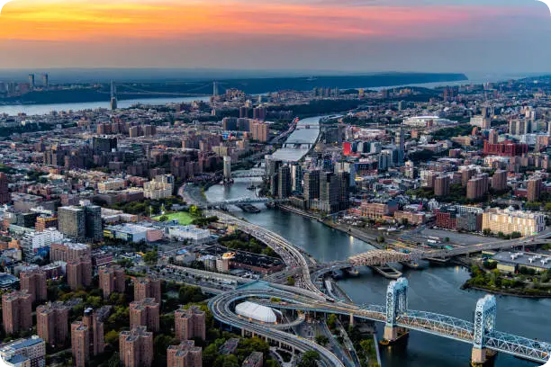 Aerial view of the Bronx skyline at sunset, home to The Rybak Firm PLLC